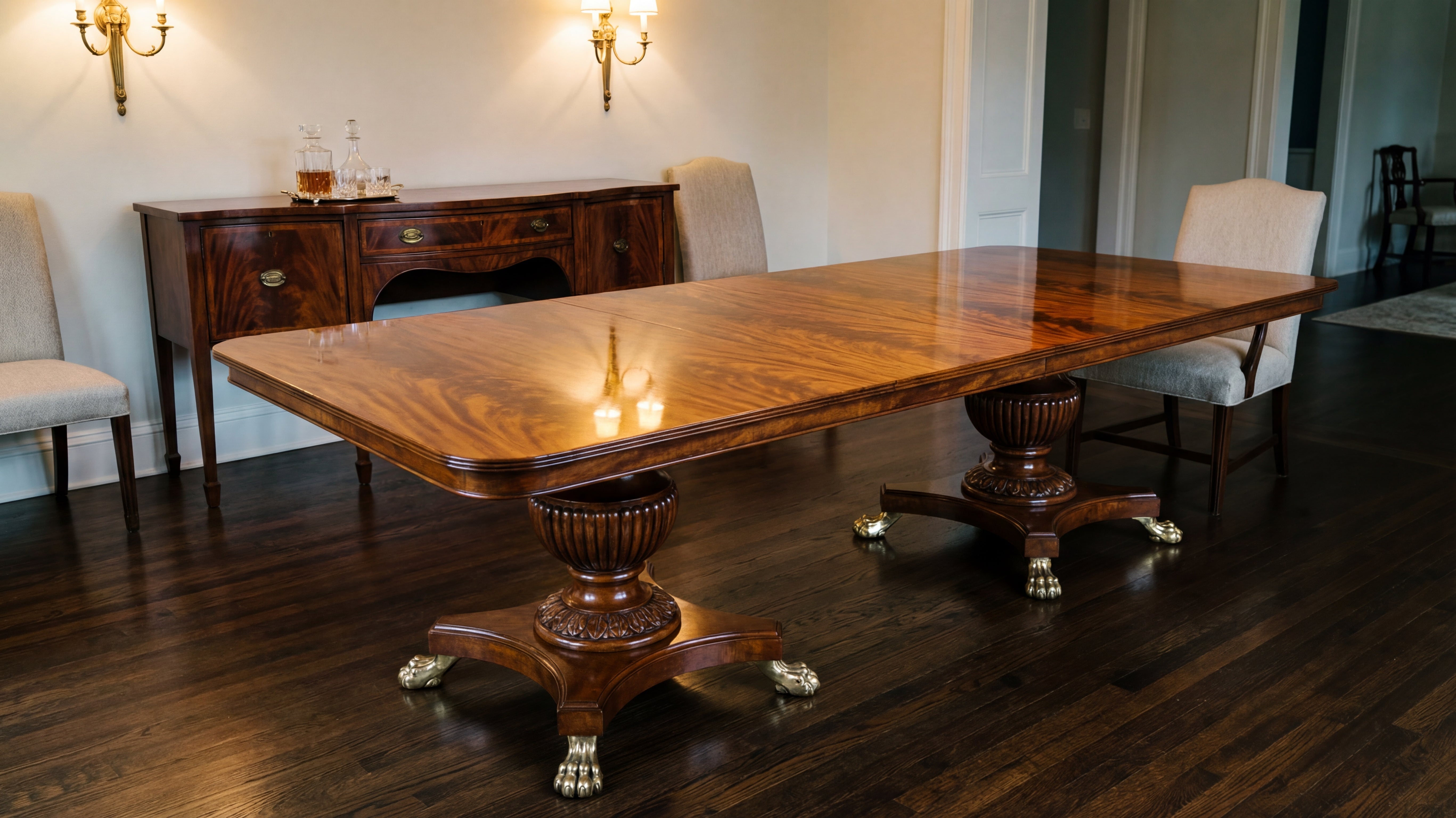 Handcrafted mahogany pedestal dining table in a refined dining room — EGA Home