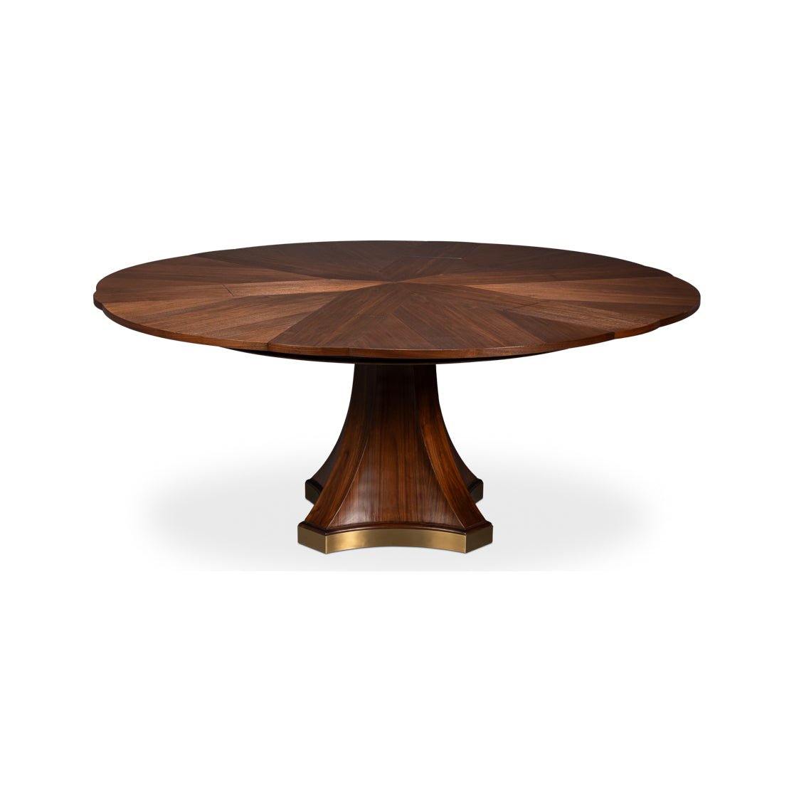 Round walnut dining table with pedestal base.