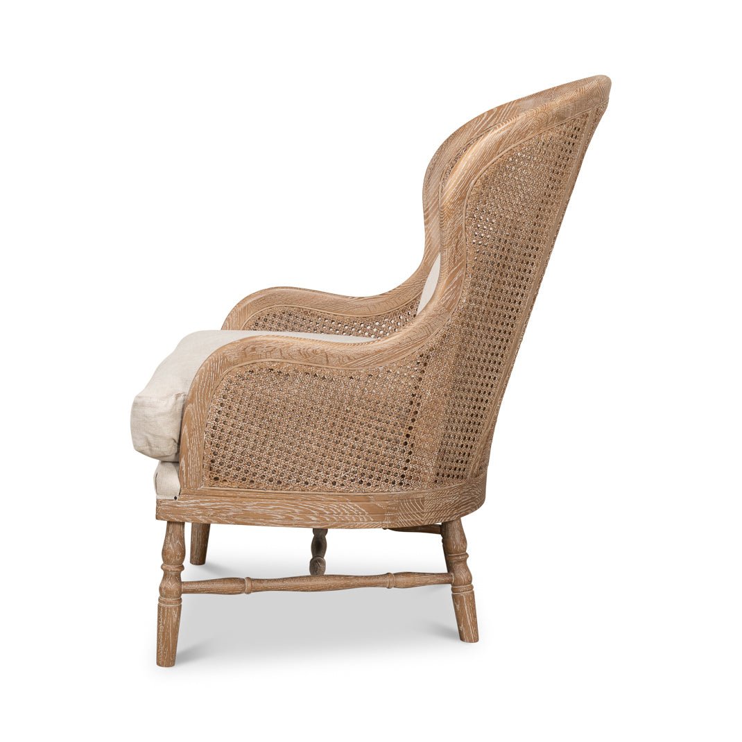Side profile of white wash French oak armchair.