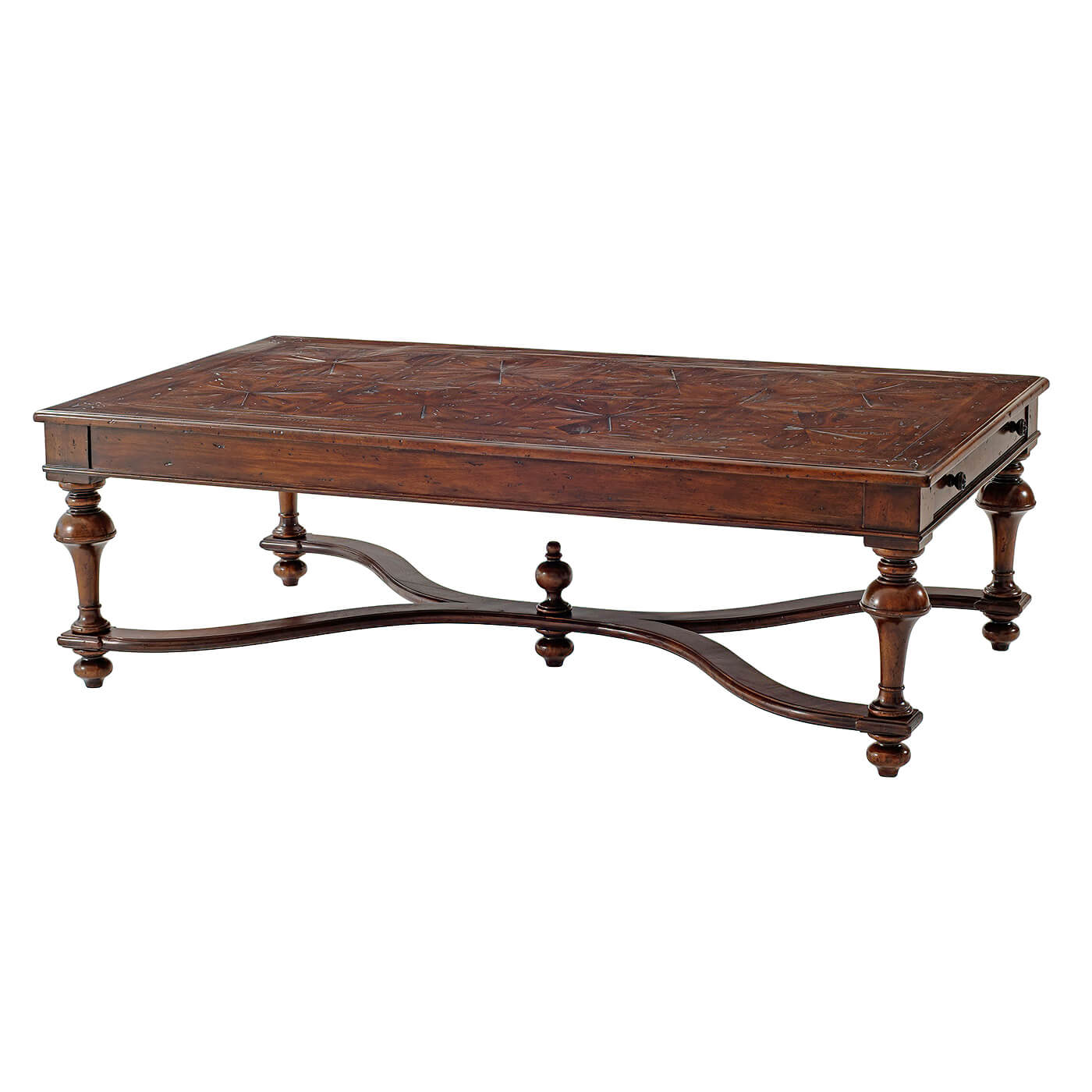 Ornate wooden coffee table with carved legs, angled view.