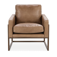 Front view of the tan leather accent chair with padded arms and an open iron base