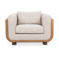 Front view of the Latte accent chair with a pale seat cushion and tan leather border