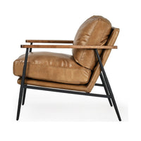 Side view of the Adobe Tan leather chair showing its angled back and splayed iron legs