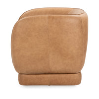 Rear view of the tan leather swivel chair showing its rounded back and center seam