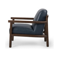 Side view of the Mystic Blue leather chair showing its open wood frame and angled back