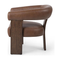 Rear three-quarter view of the Rich Cocoa leather chair showing its curved rail and broad wood support