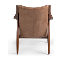 Rear view of tan leather accent chair with stitched back panel and slender ash legs