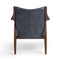 Rear view of the Ocean Blue leather chair showing its exposed ash frame