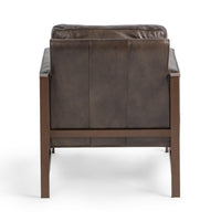 Rear view of the Truffle Brown leather chair showing paneled upholstery and bronze-finished rails