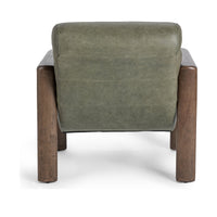 Rear view of the Soft Sage leather accent chair with a smooth back panel and dark wood legs