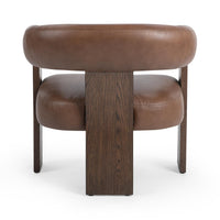 Rear view of the Rich Cocoa leather accent chair with its centered oak-veneered support