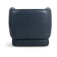 Rear view of the Mystic Blue leather swivel chair showing the center seam and upholstered base