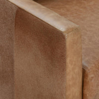 Sedona Brown swivel chair arm detail showing smooth leather beside hair on hide