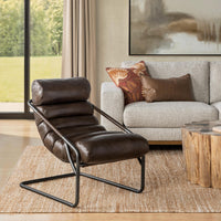 Truffle Brown leather channel-back chair styled beside a sofa and wood side table