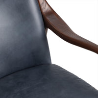 Ocean Blue leather chair detail showing the seat, back and curved ash arm