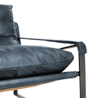 Ocean Blue leather sling chair seat and padded armrest detail