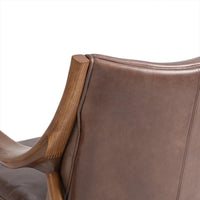 Rear backrest detail of the Barrel Brown leather chair with curved ash support
