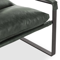 Close-up of forest green leather seat cushion, padded armrest and iron frame