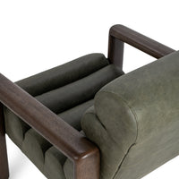 Soft Sage leather chair rear detail showing the rounded head cushion and wood arm