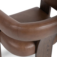 Rich Cocoa leather chair back detail showing curved stitching and the oak-veneered support