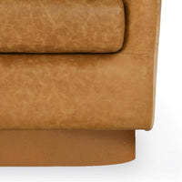 Sedona Brown swivel chair seat and base detail showing piped leather edges