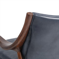 Rear backrest detail of the Ocean Blue leather chair with sculpted ash support