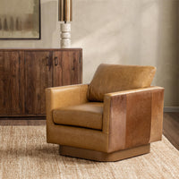 Sedona Brown hair-on-hide leather swivel chair styled beside a wood cabinet