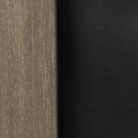 Black leather and weathered wood frame material close-up