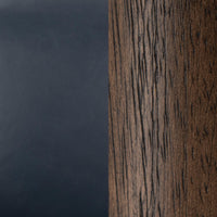 Mystic Blue leather and dark wood grain material close-up