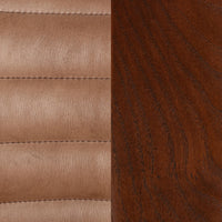 Detail of channel-stitched tan leather beside dark ash wood grain