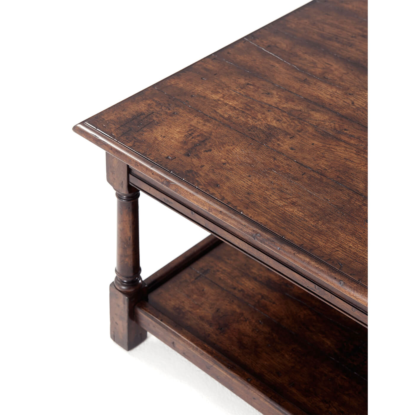 Close-up of cocktail table corner and shelf.
