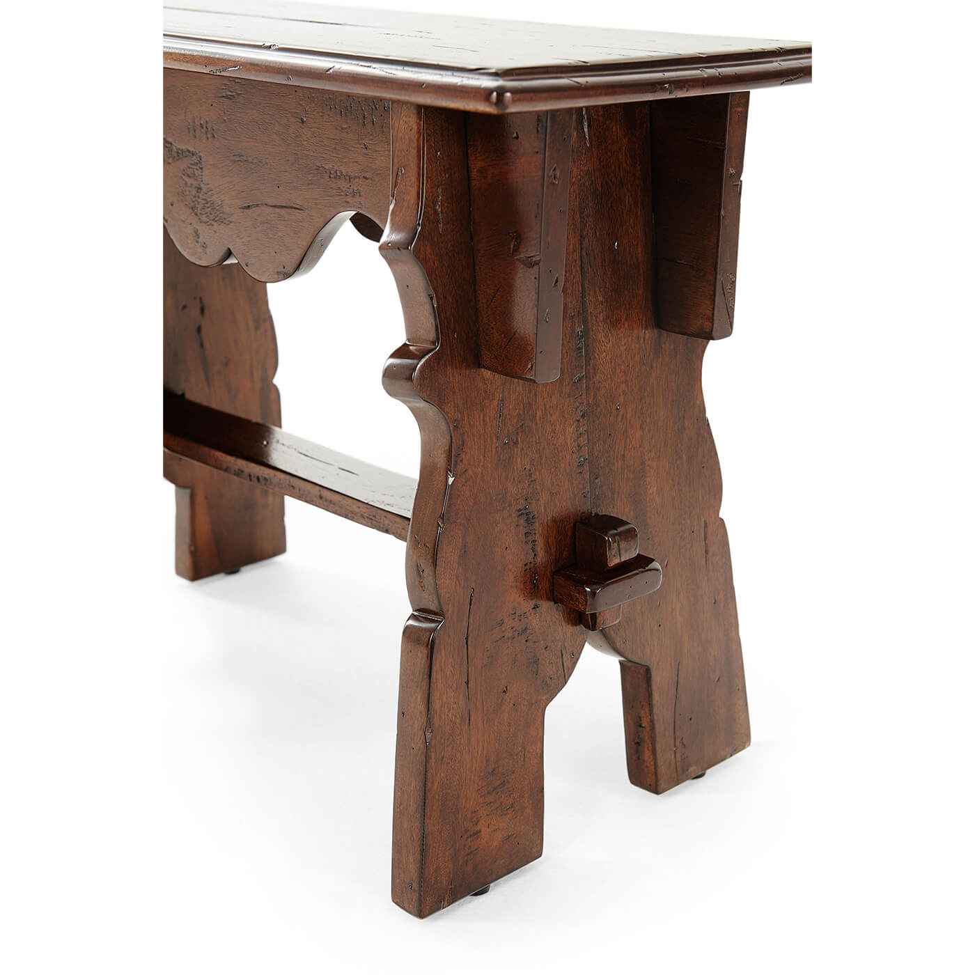 Close-up of wooden joint stool, leg design detail.
