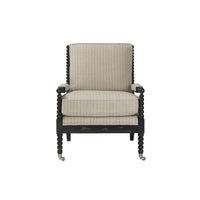 Front close-up 19th-century style spool turned armchair.