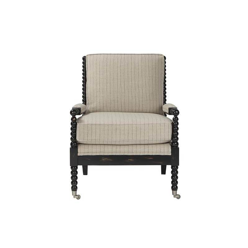 Front close-up 19th-century style spool turned armchair.