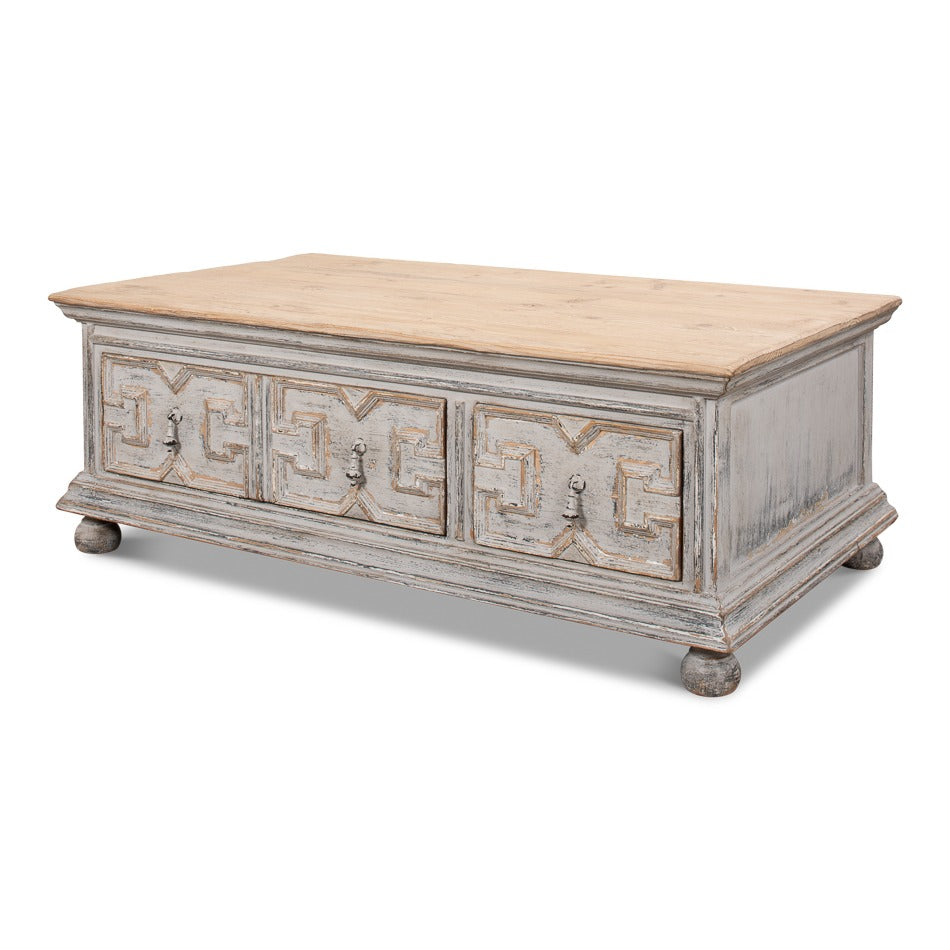 Traditional rectangular pine coffee table with antique Swedish gray base, carved Greek key drawer fronts, iron ring pulls, and bun feet