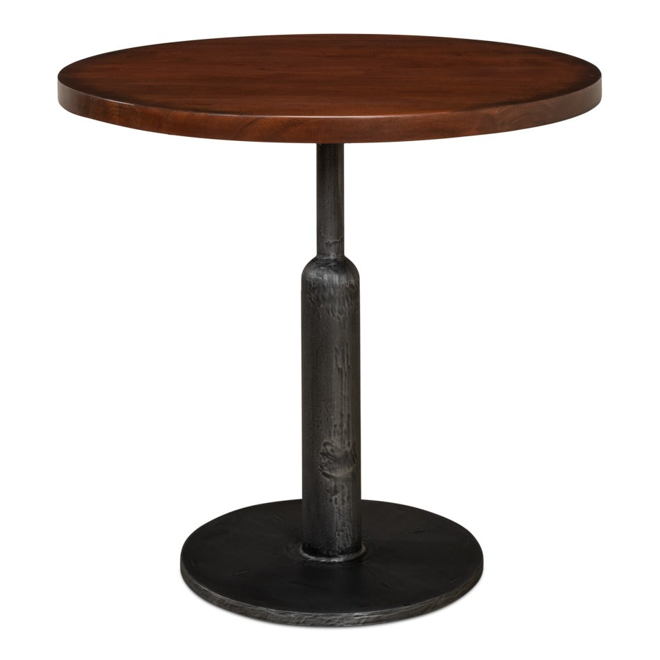 round walnut bistro table on a gunmetal iron pedestal base