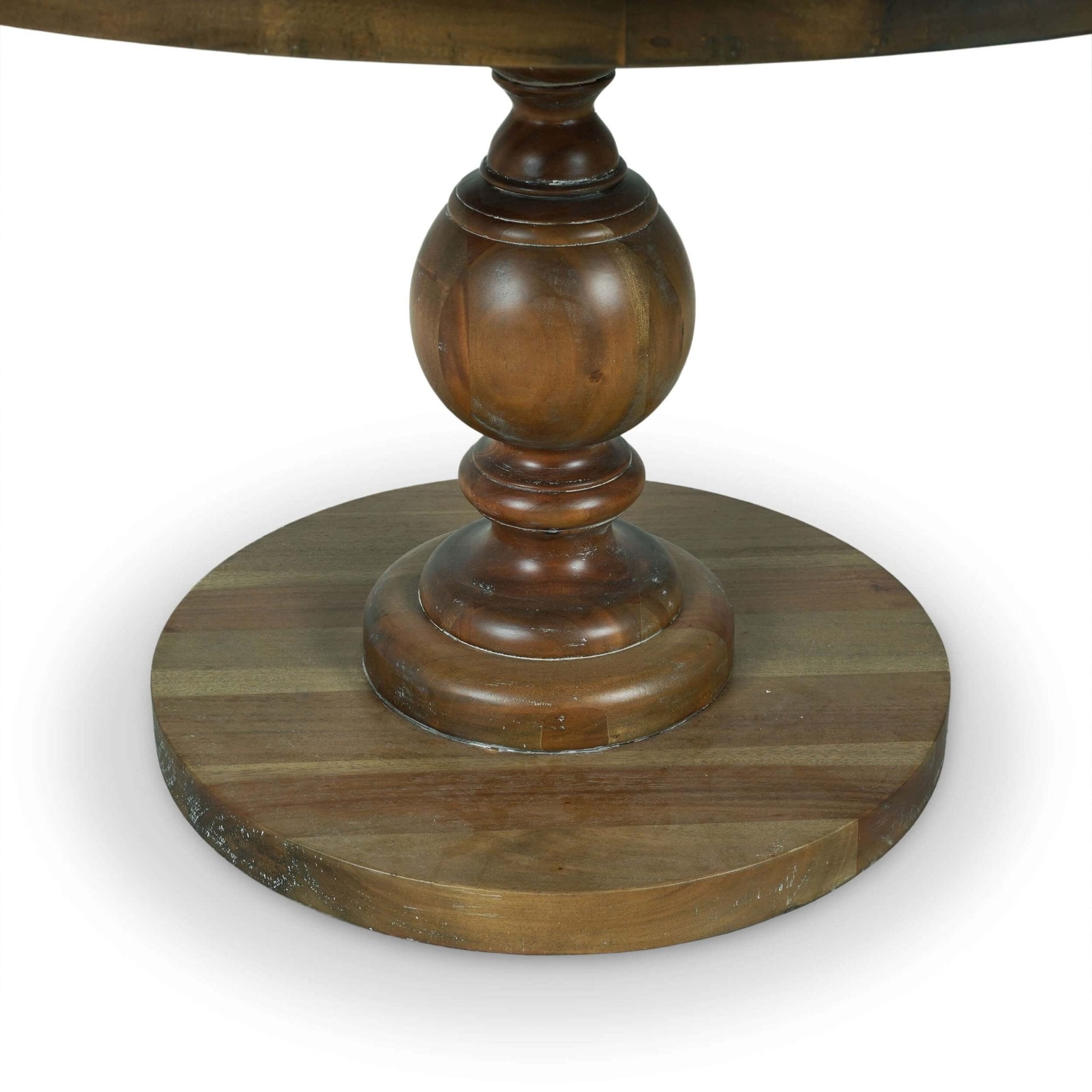 Detailed view of round table base and pedestal design.