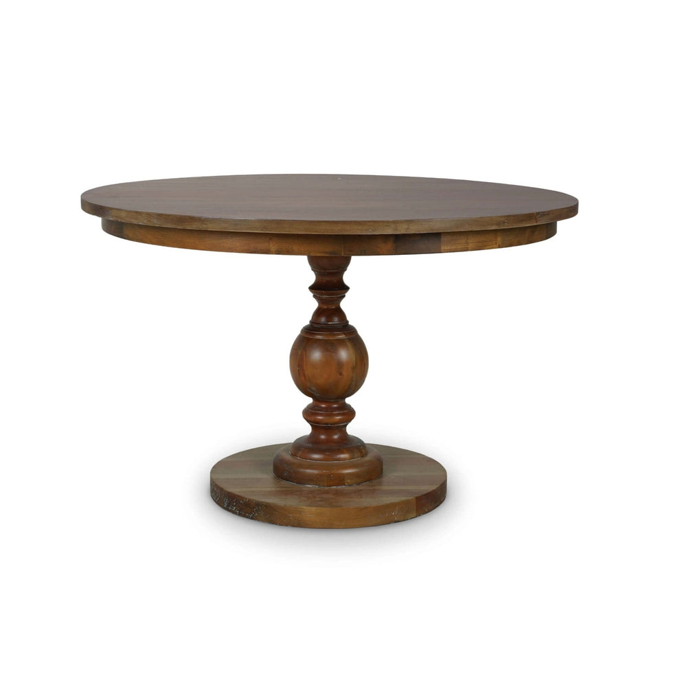 Round pedestal dining table with brown finish, front view.