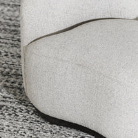 Close-up of the Coastal Breeze chair's textured seat and curved inner-back seam