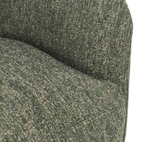 Close-up of the Antique Green chair's textured fabric at the seat and inner back