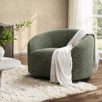 Antique Green swivel chair styled with a white throw beside a window