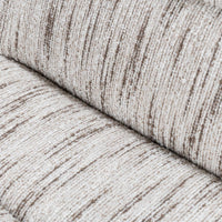 Close-up of brown markings woven through the Cocoa Cream chair's pale upholstery