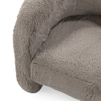 Close-up of the Granite chair's faux fur seat and rounded inner arm