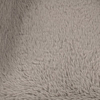 Close-up of the Granite chair's long faux fur fibers
