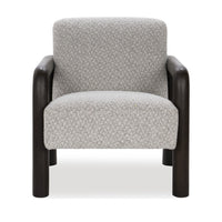 Front view of the pale upholstered chair with rounded dark wood arms