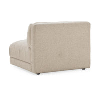 Rear three-quarter view of the Buttermilk chair with a plain upholstered back