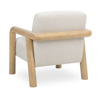 Rear three-quarter view of the Sand chair with an exposed wood back rail