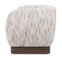 Side view of the Cocoa Cream swivel chair with streaked upholstery and a dark wood base