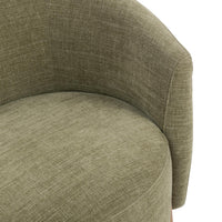 Close-up of the Sage Dust chair's rounded seat and curved upholstered back