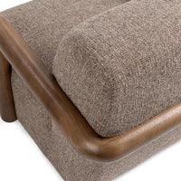 Elevated rear detail of the Warm Mocha chair's curved wood rail and upholstered back